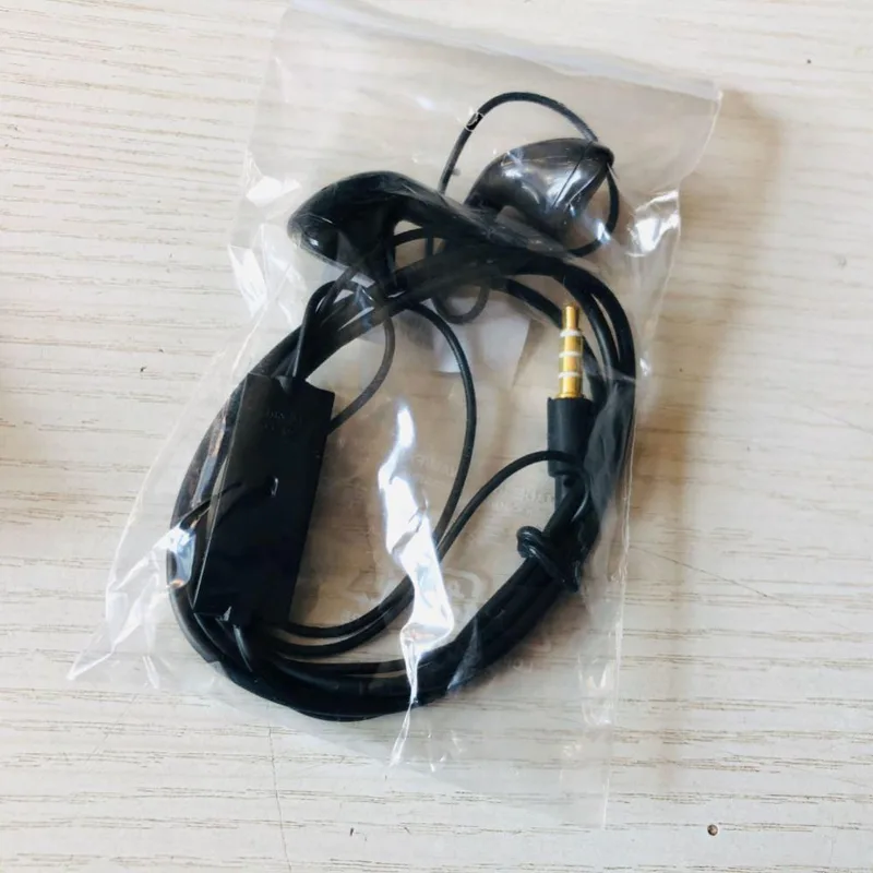 Mini in-ear trådbundet headset